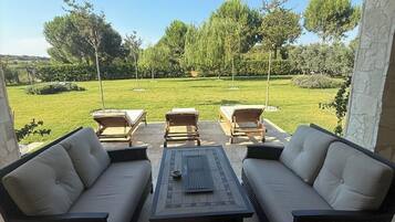 Deluxe Condo, Garden View | Outdoor dining