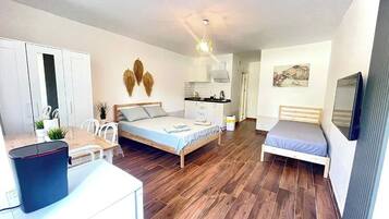 Deluxe Condo, Garden View | Blackout curtains, soundproofing, iron/ironing board, free WiFi