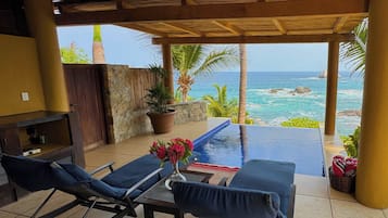 Suíte standard, vista para o oceano | Terraço/pátio