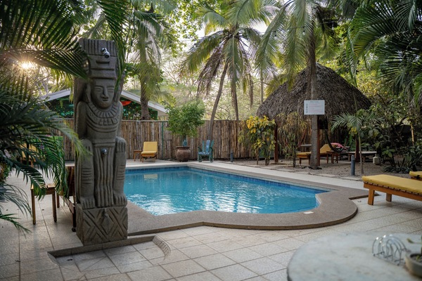 Outdoor pool, open 8:00 AM to 10:00 PM, free cabanas, sun loungers