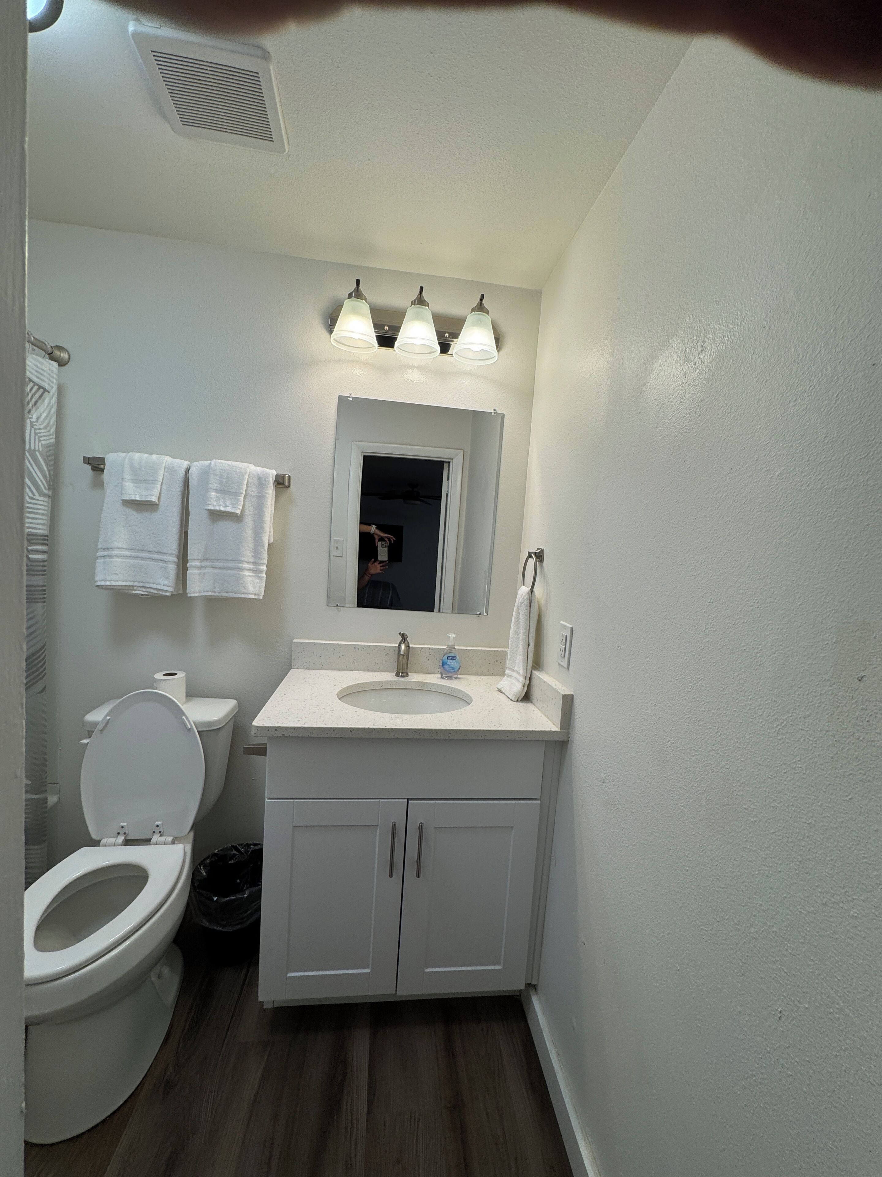 Hair dryer, towels, soap, toilet paper