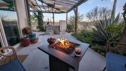 Watch the sunset from a private hot tub!