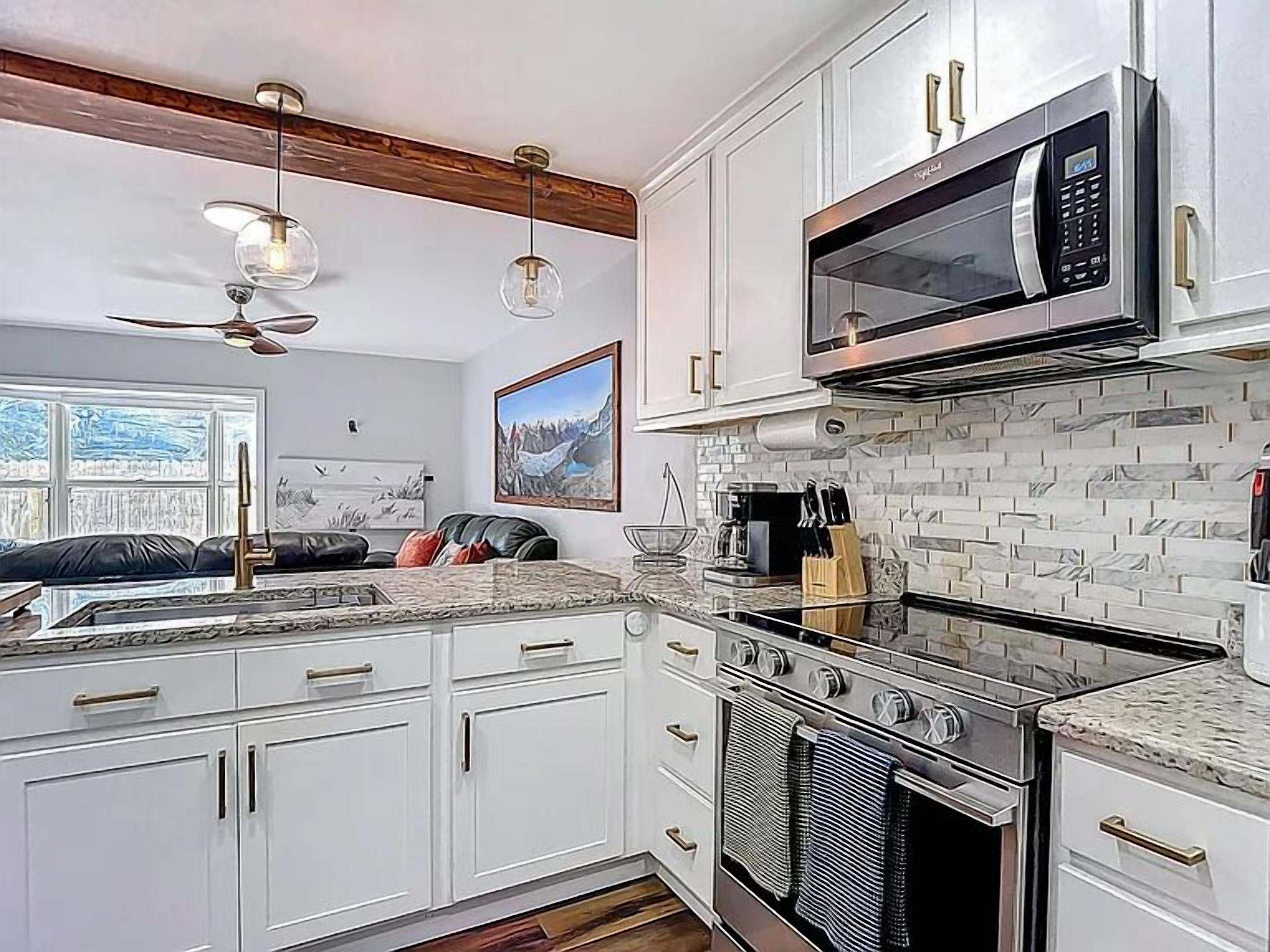 Coffee/tea maker, fridge, microwave, oven