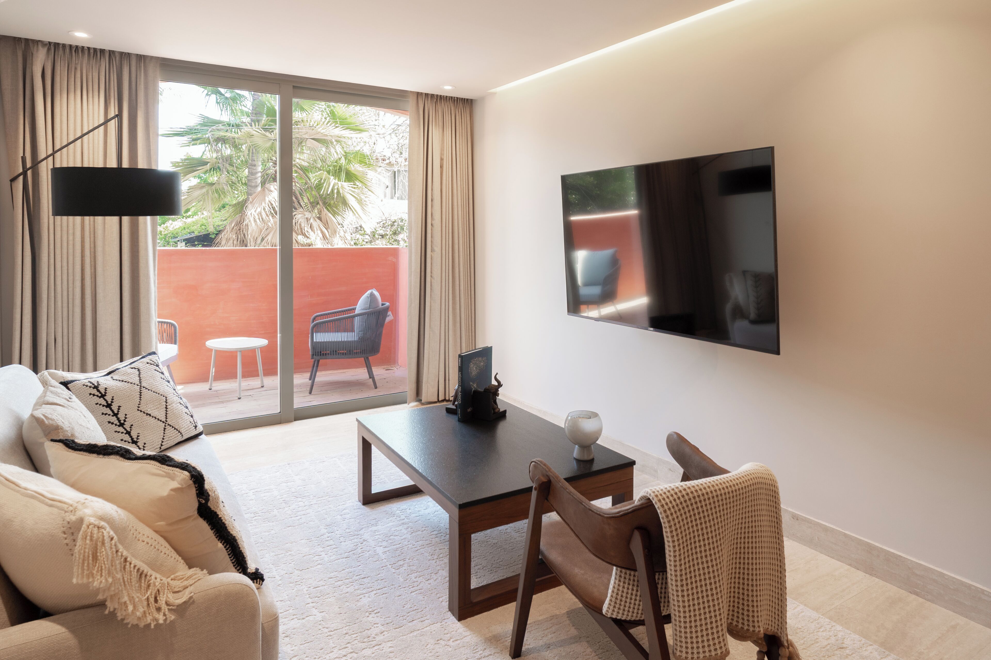 Design Apartment, Courtyard View | Living area | 65-inch Smart TV with digital channels