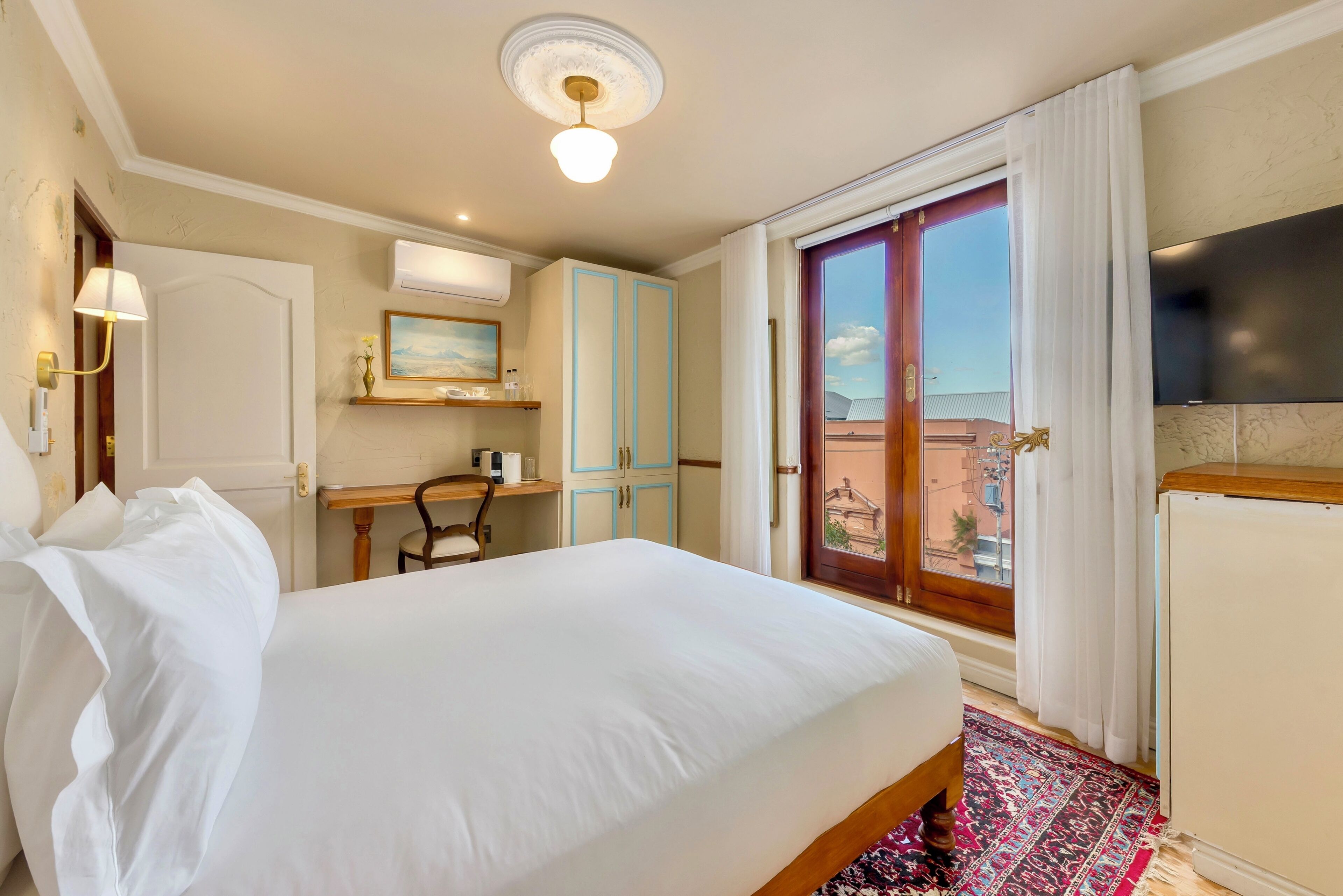 Deluxe Double Room, Mountain View | Desk, laptop workspace, iron/ironing board, free WiFi