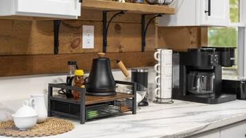 Coffee/tea maker, fridge, microwave, oven