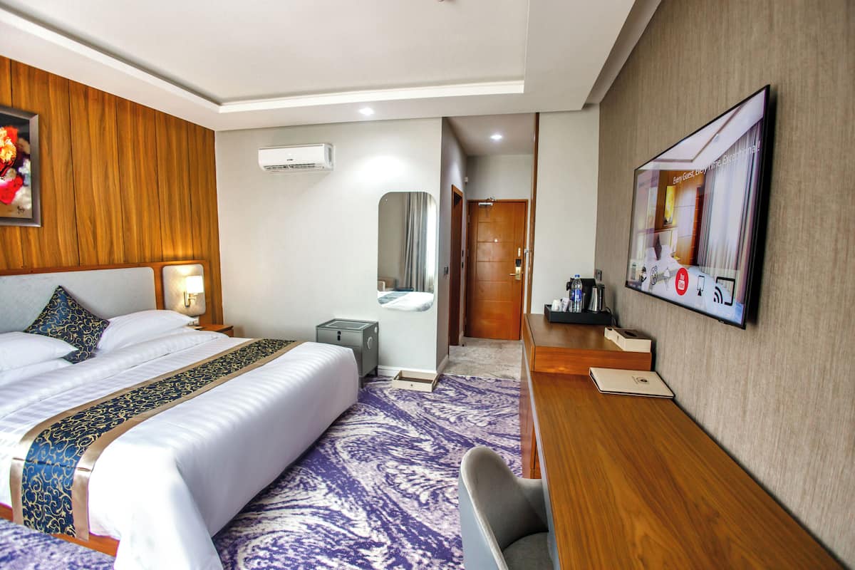Habitación Deluxe | Sábanas de algodón egipcio, ropa de cama de alta calidad y edredón 