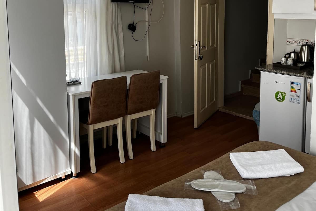 Standard Double Room, City View | Desk, laptop workspace, WiFi (free), bed sheets