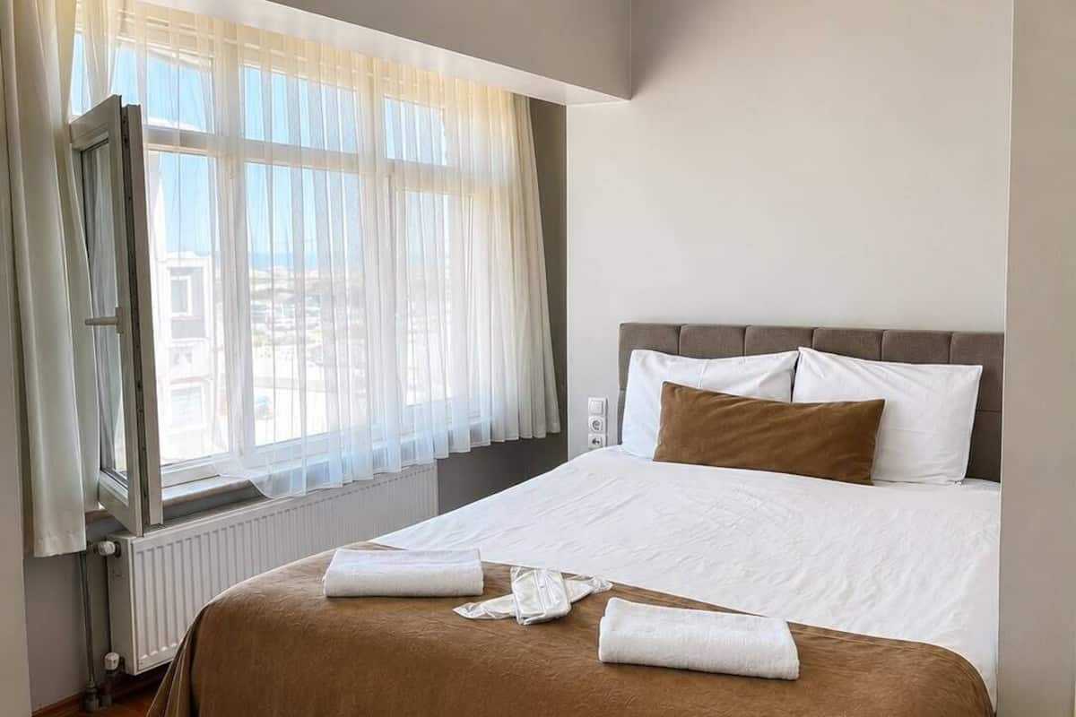 Standard Double Room, City View | Desk, laptop workspace, WiFi (free), bed sheets