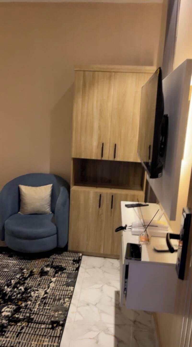 Deluxe Single Room | Ruang tamu | TV Pintar 