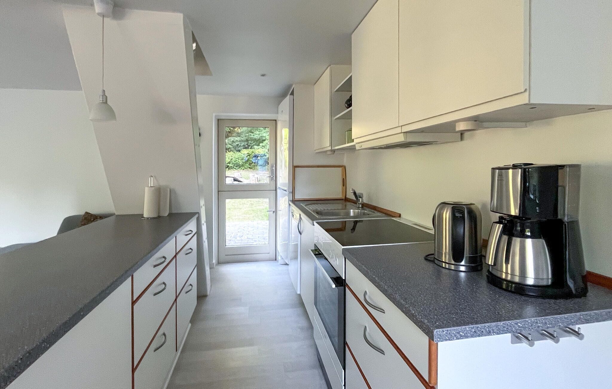 Coffee/tea maker, fridge, stovetop, dishwasher