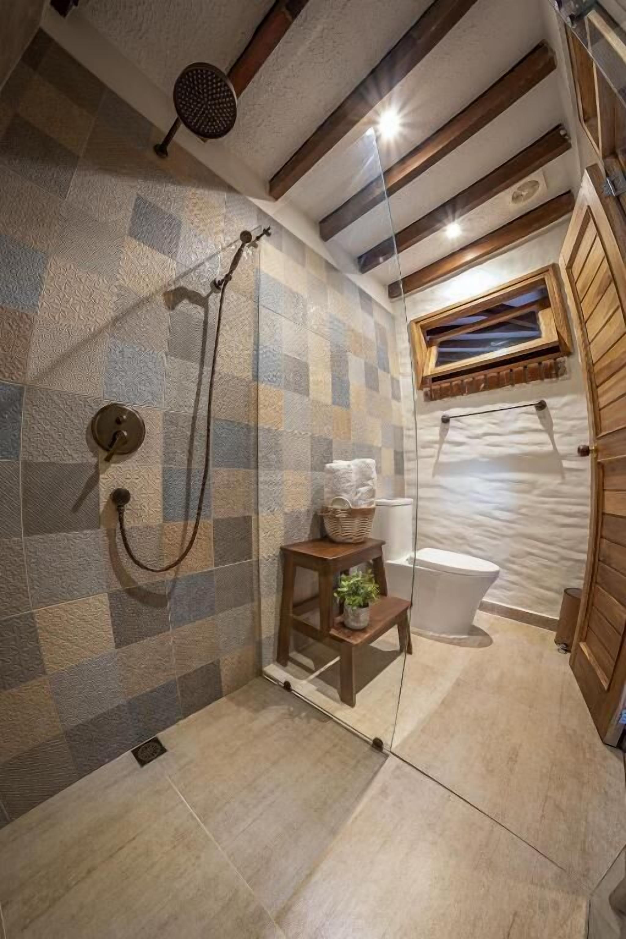 Suite Deluxe, balcón, vista al jardín | Baño