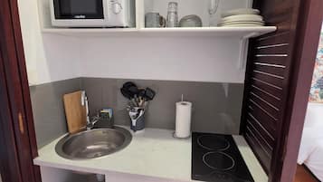 Suite Confort, balcon, vue sur l’océan | Cuisine privée