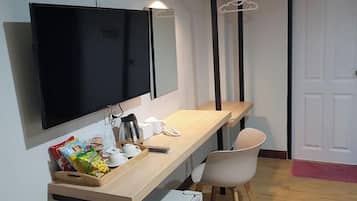 Habitación Deluxe doble | Minibar con artículos gratuitos, escritorio, wifi gratis y ropa de cama