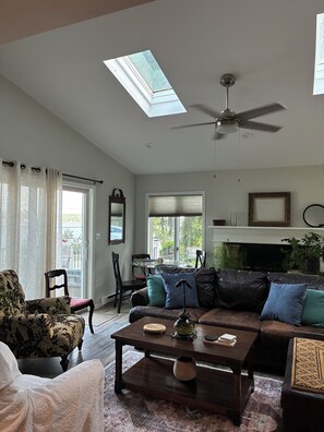 Living area - Please, enjoy this inviting & soothing restored horse barn, “A Touch of Gray”. (Livonia)