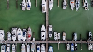 An aerial view of a marina with numerous boats docked at wooden piers. - Zeewind "close to the beach" by Interhome (Blankenberge)
