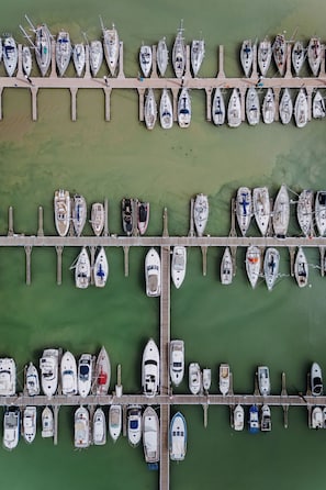 An aerial view of a marina with numerous boats docked at wooden piers. - Zeewind "close to the beach" by Interhome (Blankenberge)