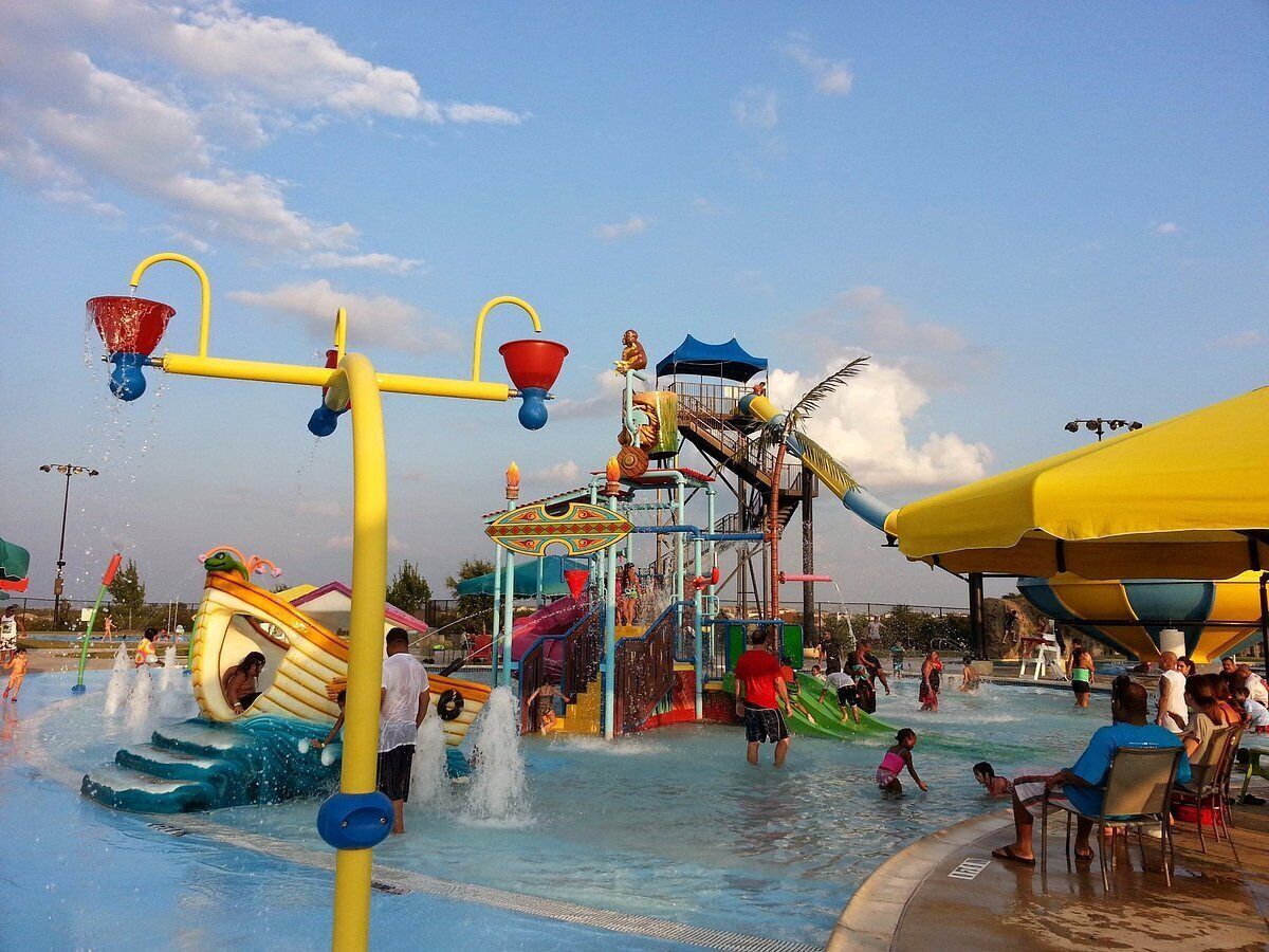 A water park with various water features and slides.