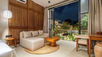 Design Apartment, 1 Bedroom, Courtyard View | Living area | 50-inch Smart TV with digital channels