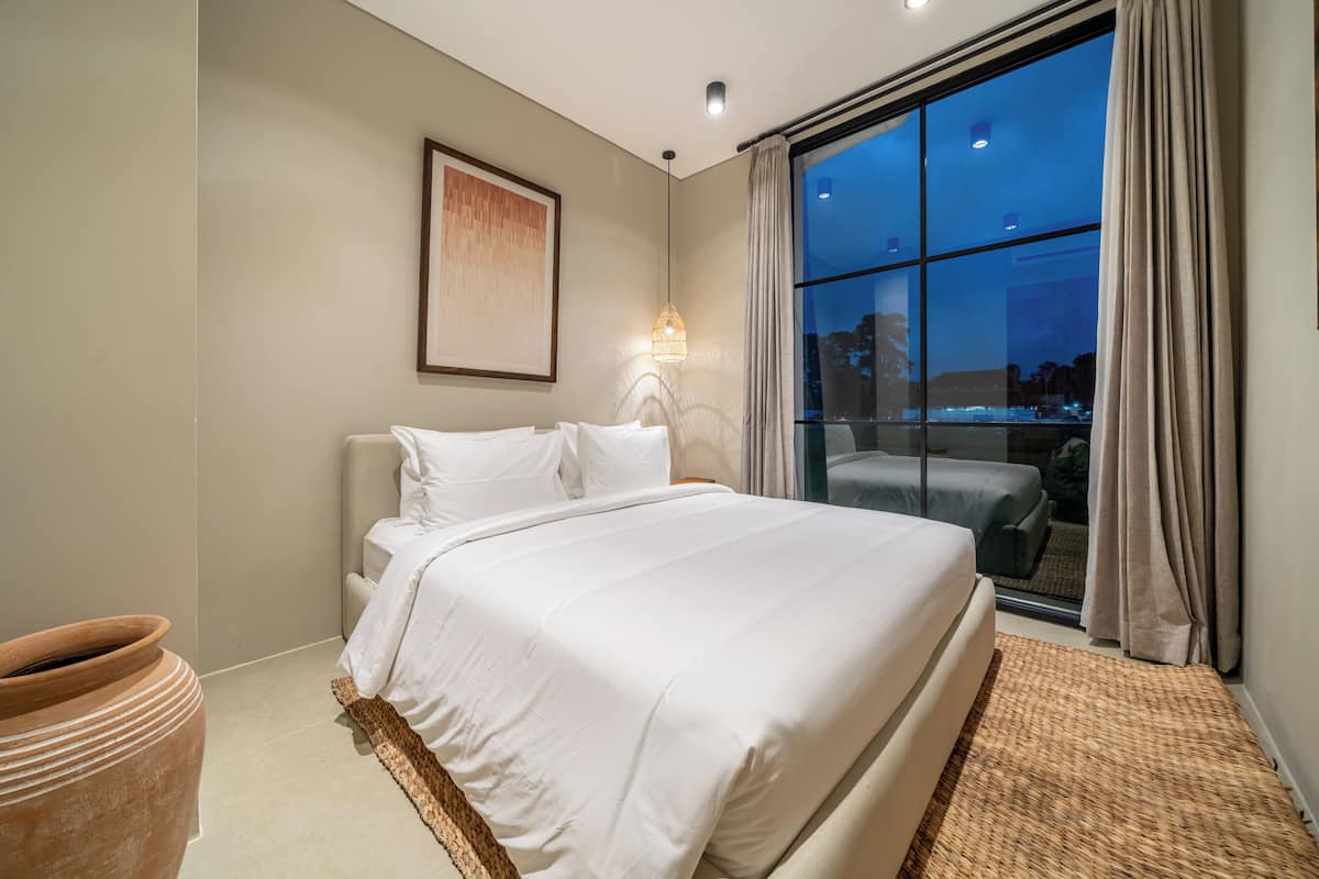 Appartement Deluxe, 2 chambres, vue sur le jardin | Draps en coton égyptien, literie de qualité, coffre-fort