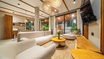 Deluxe Villa, 2 Bedrooms, Private Pool | Living area | 50-inch Smart TV with digital channels