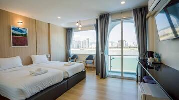 Deluxe Twin Room, 2 Twin Beds, Balcony, River View | Desk, laptop workspace, blackout drapes, soundproofing