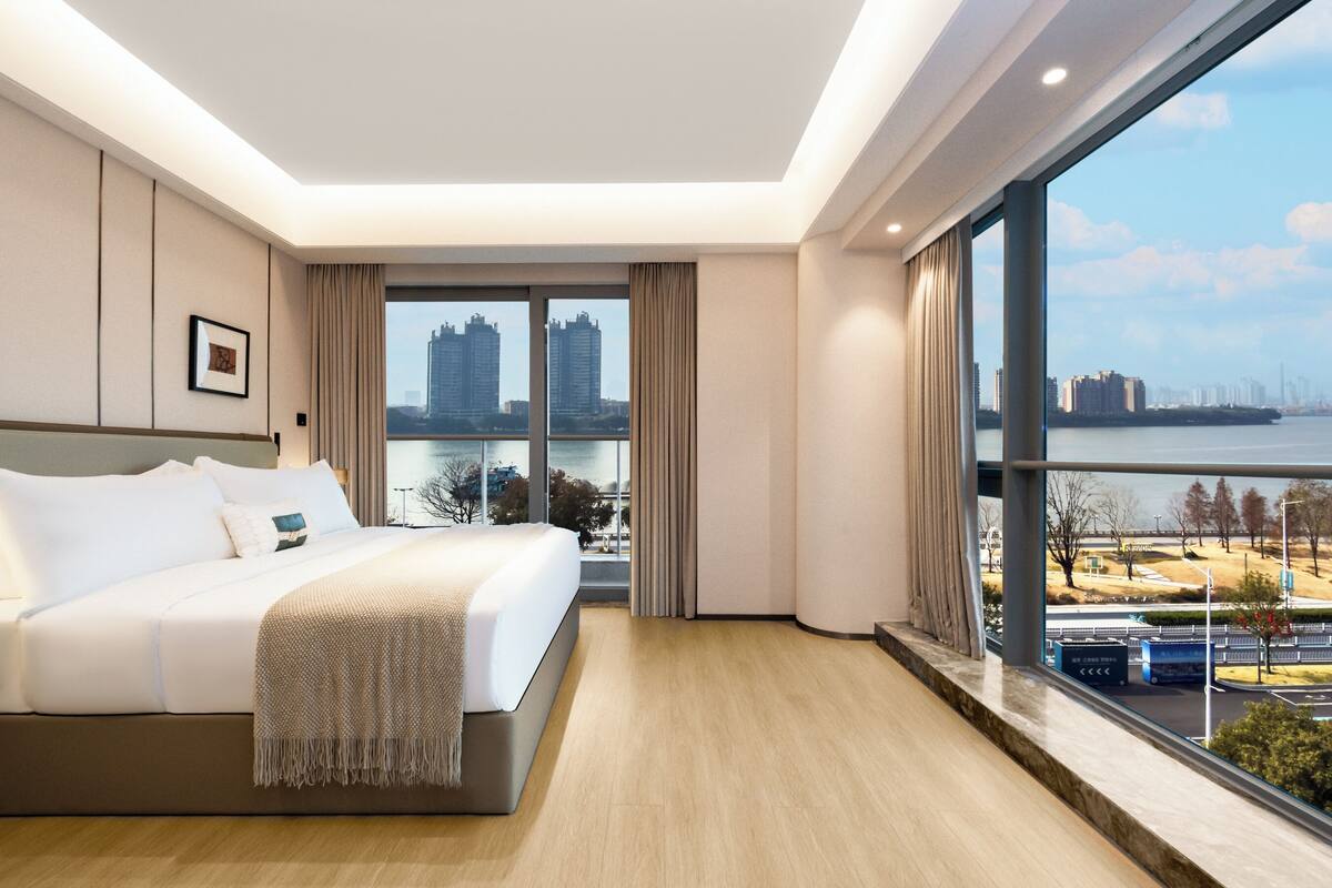 Superior Suite, 2 Bedrooms, River View | Blackout curtains, soundproofing, iron/ironing board, free WiFi