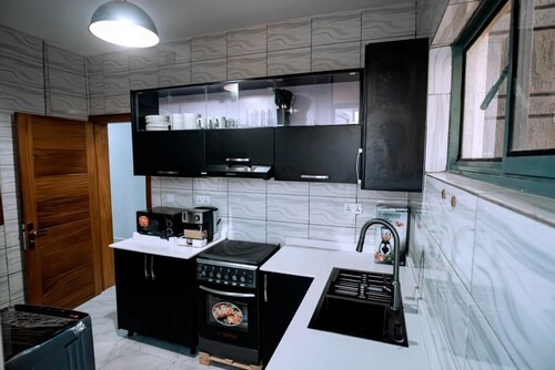 Cozy 2-bedroom apartment in tranquil Kigali with AC