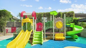 A playground with slides and climbing structures. - Solea by Kozystay - Senayan (South Jakarta)
