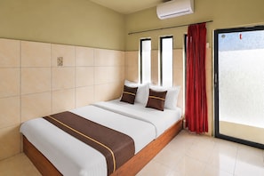 Kamar Double Deluks | Setrika/meja setrika dan seprai linen
