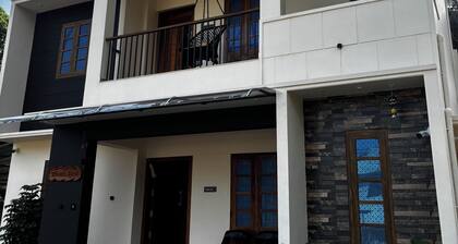 Tranquil 2-bedroom house with AC in delightful Varkala