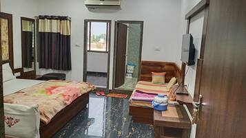 Family AC Room with Ensuite Bathroom | WiFi (free), individually furnished, bed sheets