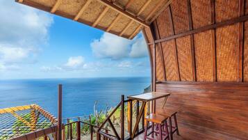 Habitación doble, vista al mar | Terraza o patio