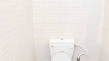 Shower, rainfall showerhead, slippers, towels