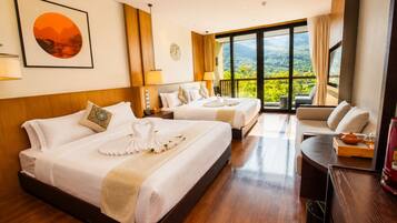 Deluxe Twin Room, Hill View | Minibar, desk, laptop workspace, blackout drapes