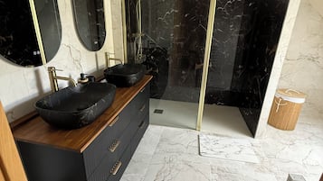 Shower, hair dryer, towels, toilet paper