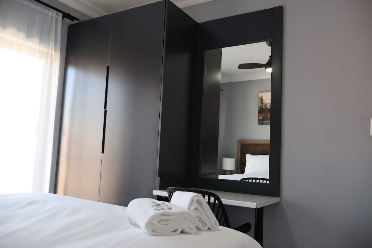 Deluxe Apartment, Balcony, Mountain View | Desk, laptop workspace, blackout drapes, iron/ironing board (on request)