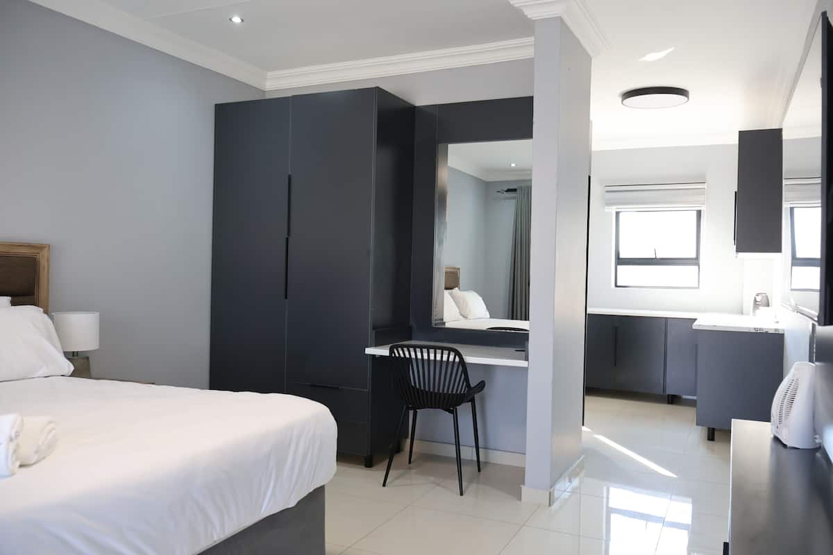 Deluxe Studio Suite, Balcony, Mountain View | Desk, laptop workspace, blackout drapes, iron/ironing board (on request)