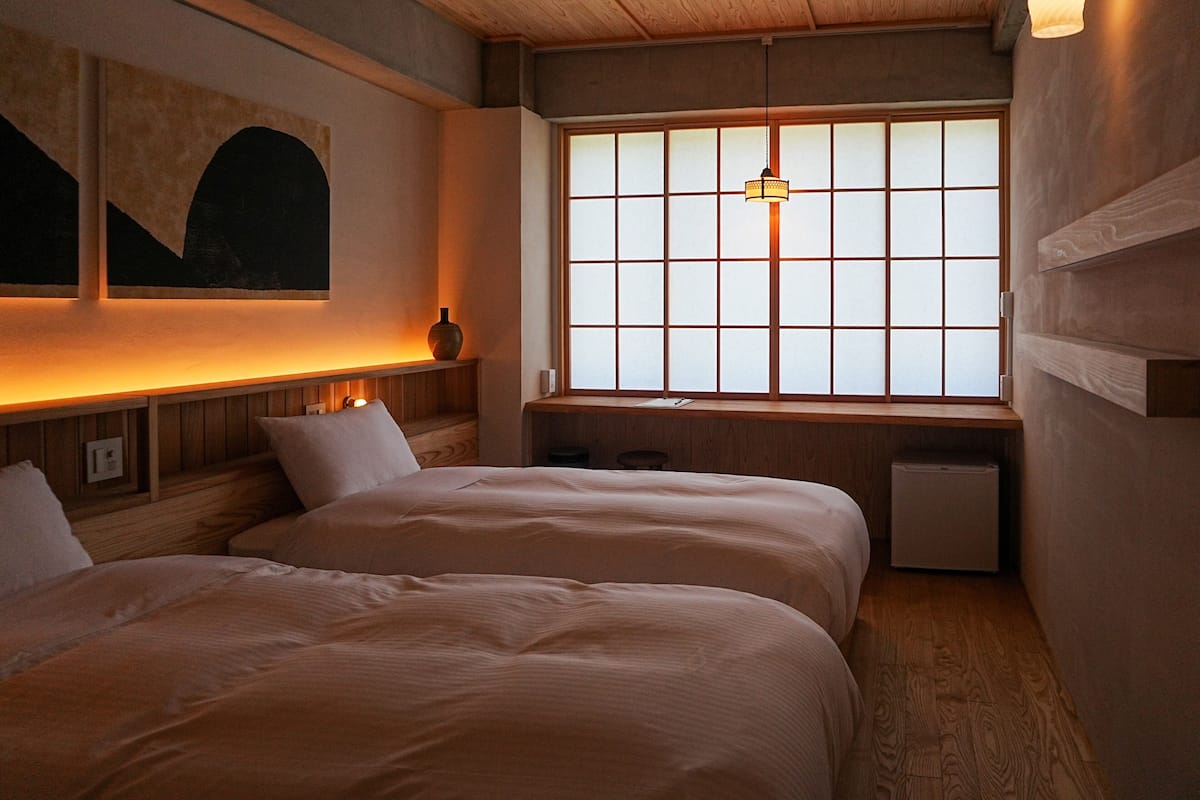 Twin Room, Private Bathroom, River View | Desk, laptop workspace, blackout drapes, WiFi (free)