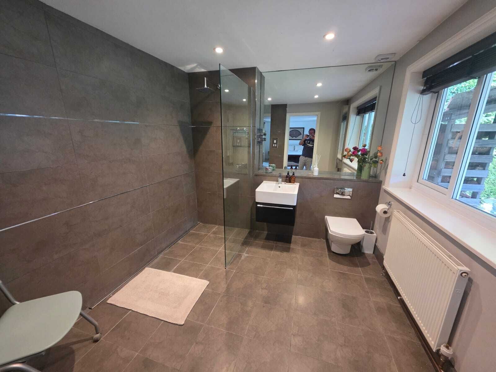 Shower, towels, soap, toilet paper