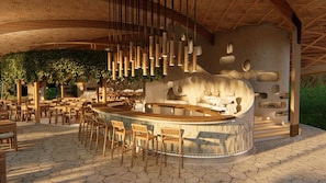 A restaurant with a curved bar, wooden chairs, hanging light fixtures, and a thatched ceiling. - Vikasa Evolution Retreat Phuket (Koh Lon)