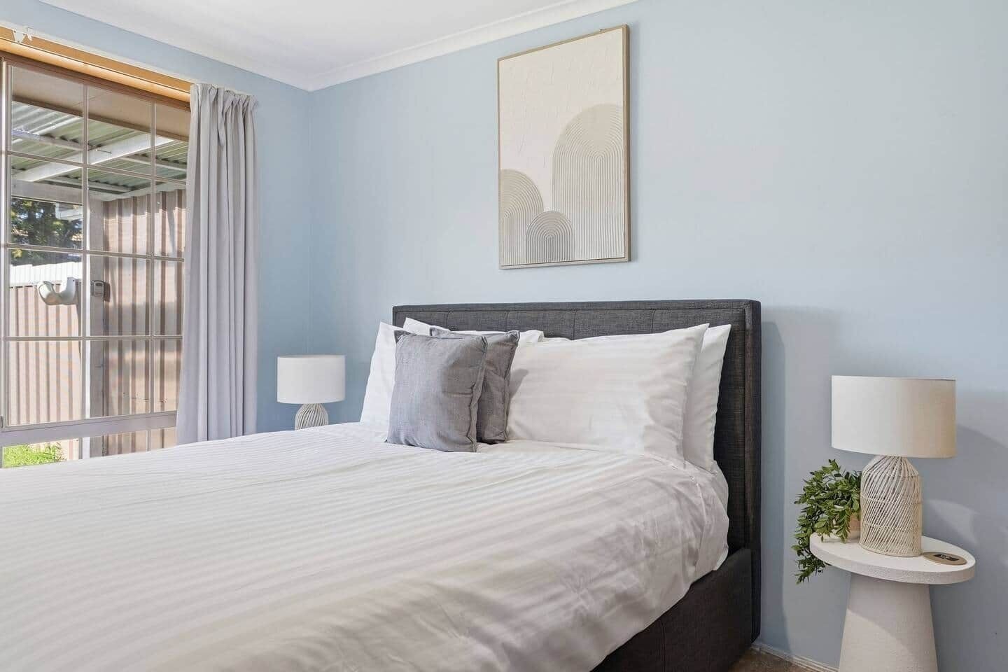 Bright bedroom designed for restful holiday nights.