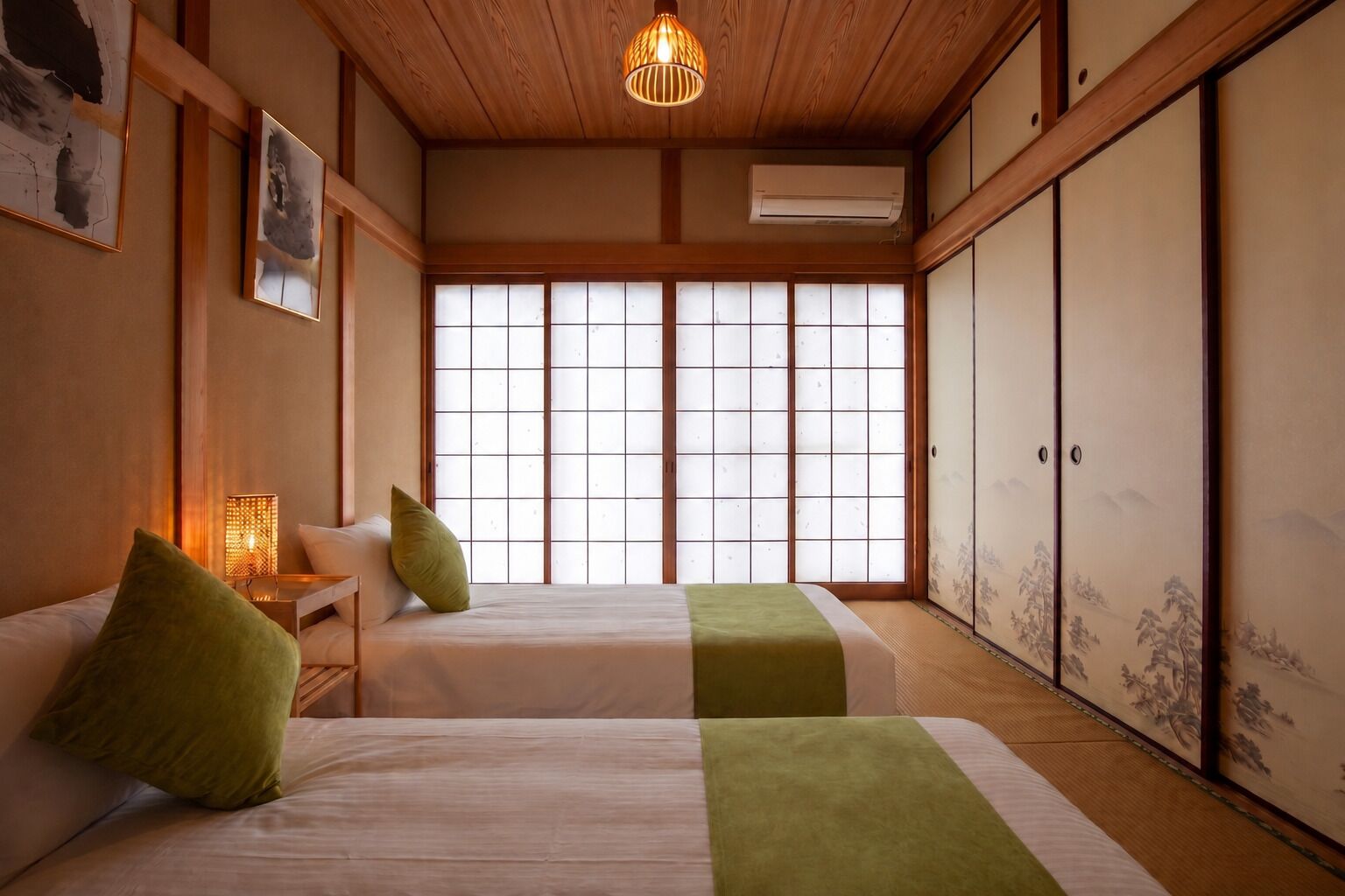 A traditional Japanese-style room with tatami flooring, two beds with green accents, a shoji screen window, and a hanging light fixture.