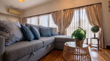 Family Villa, Balcony, Partial Ocean View | Living area