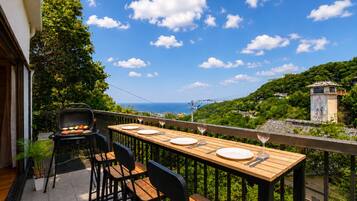 Family Villa, Balcony, Partial Ocean View | Blackout drapes, iron/ironing board, WiFi (free), bed sheets