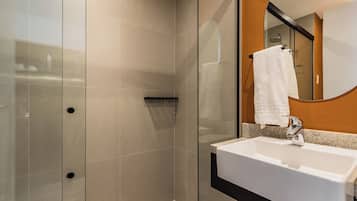 Superior Studio | Bathroom | Shower, hair dryer, towels, soap