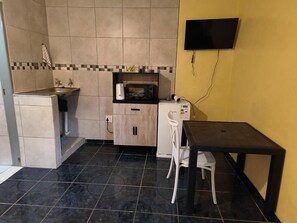 Fridge, microwave, cookware/dishes/utensils