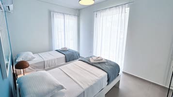 2 dormitorios, tabla de planchar con plancha, wifi y ropa de cama