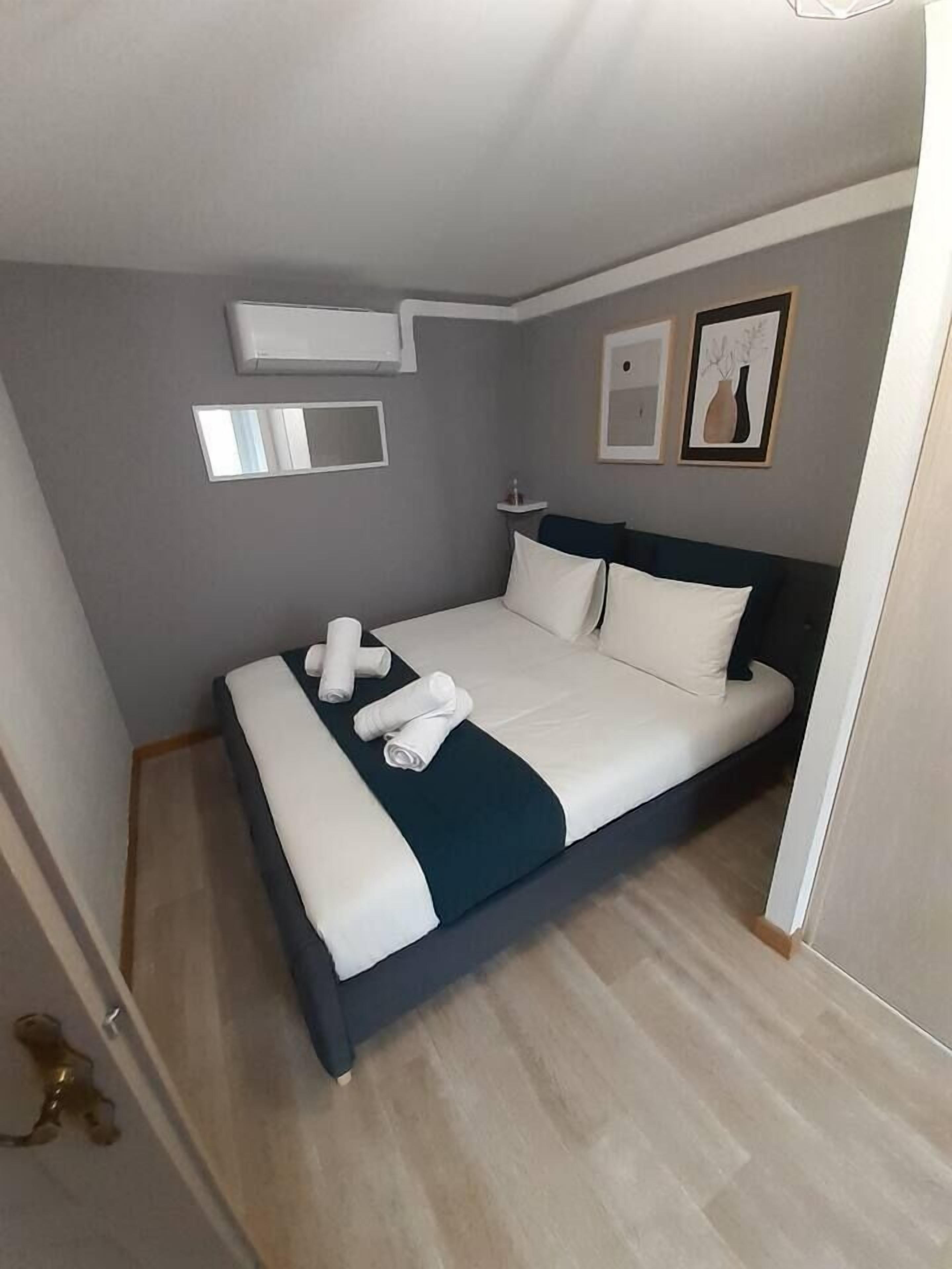 1 bedroom, desk, iron/ironing board, travel cot