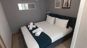 1 bedroom, desk, iron/ironing board, travel cot